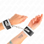 KINK – BLACK WRIST RESTRAINTS WITH WHITE DECORATE LACE ADJSUTABLE 20-23 CM X 5.5 CM